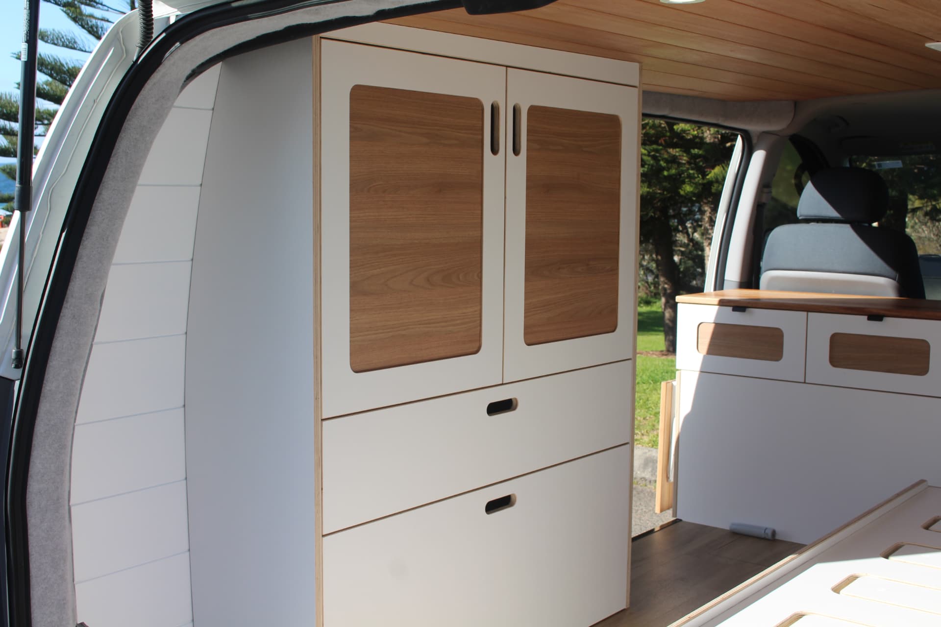 iLoad Camper — Wardrobe and drawer stack from the side door