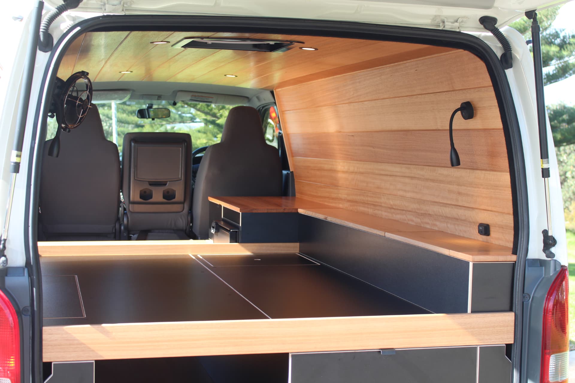 Hiace 200 Series Weekender — Rear open with the full layout in view